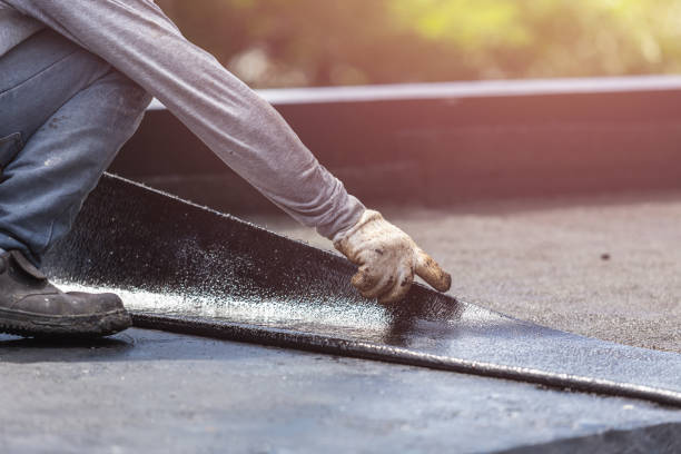 Professional Emergency Waterproofing technician working in Arlington, MN